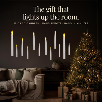 Floating candles in a living room next to a Christmas tree and gifts